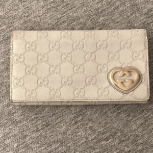 Gucci Cream Embossed GG Continental Wallet with Gold Heart Logo